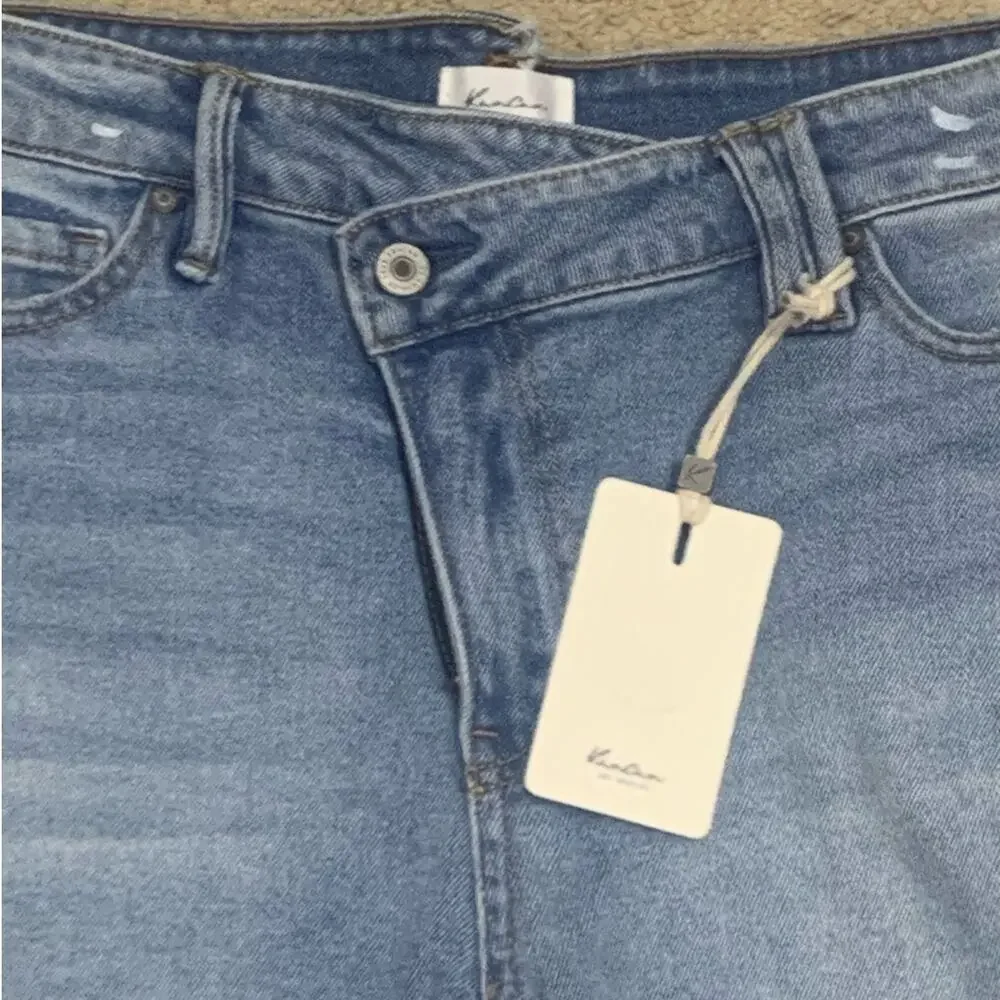 Kancan Riley Asymetrical‎ crisscross shorts raw hem sz 29 NWT